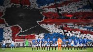 Rangers fans sing national anthem and display mosaic of Queen before UCL match